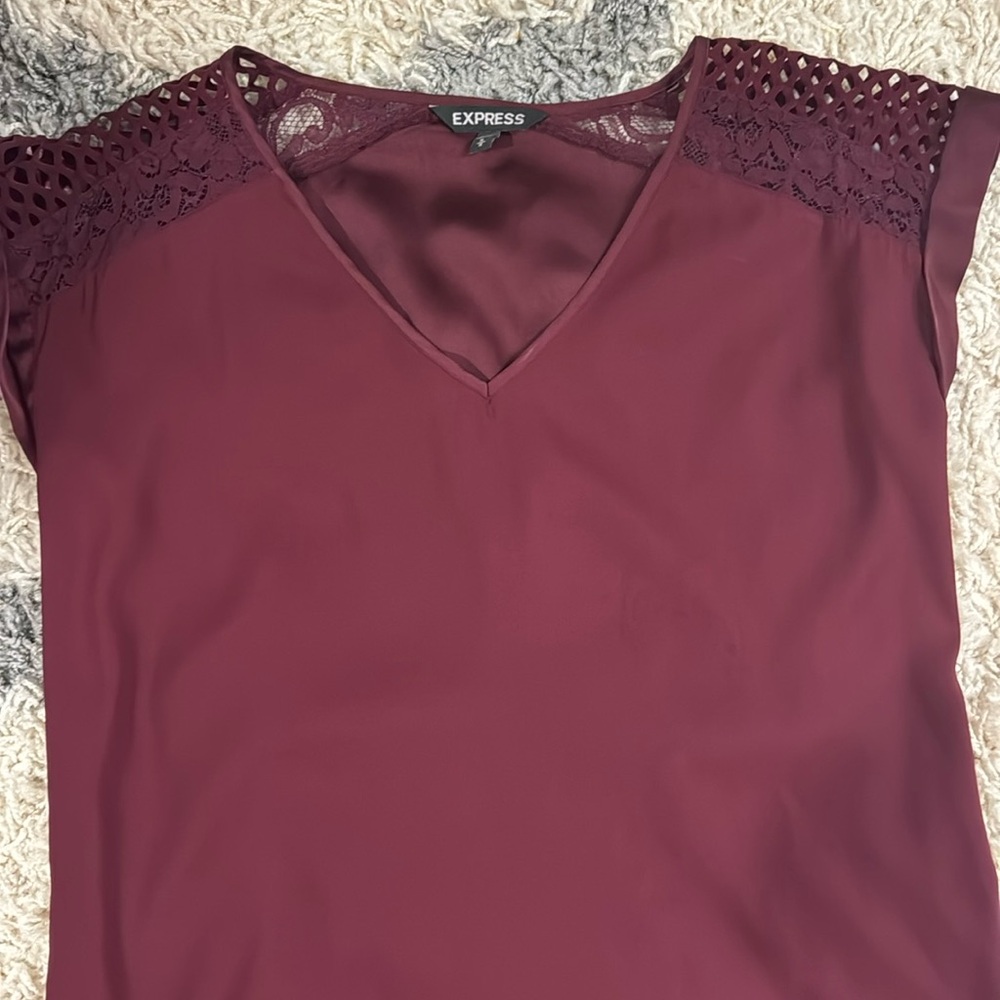 Like new!  Worn once, maroon silky Express top, cut out sleeves with lace back